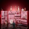 Lookfantastic Fragrance Advent Calendar 2026, all 25 drawers open with the perfume selection on top against a red background