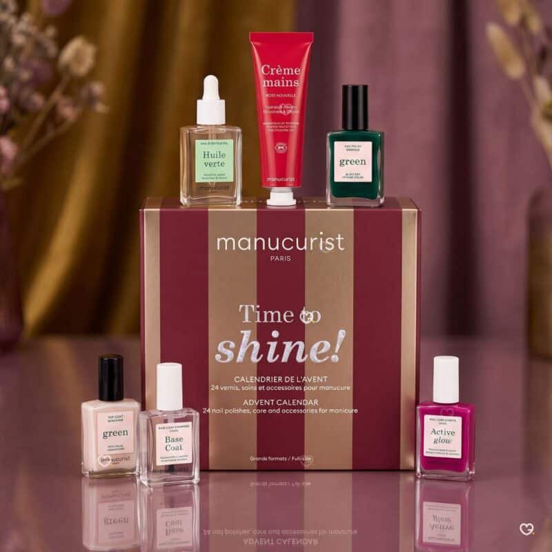 Manucurist advent calendar 2026 with Huile Verte, Rose Hand Cream and Emerald green polish in a floral setting