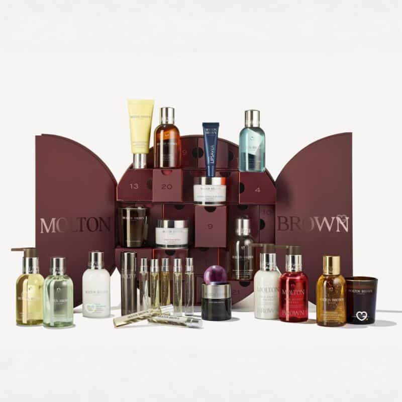 All 24 products of the Molton Brown Advent Calendar 2026 laid out, fragrances, candles and body care