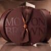 Molton Brown Advent Calendar 2026 round gift box reflected in a mirrored studio setup