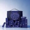 Payot Advent Calendar 2026, 24 numbered doors in front of the denim vanity case