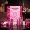 All 24 products from the Revolution Beauty Advent Calendar 2026 laid out on a dark background