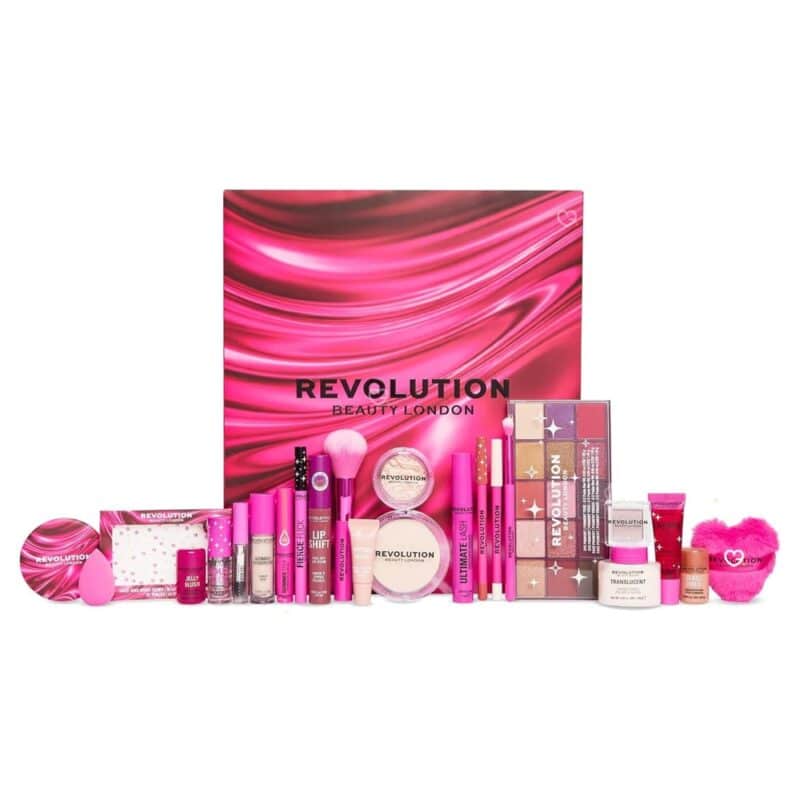 Revolution Beauty makeup advent calendar 2026 flat lay including Reloaded Palette and lip products