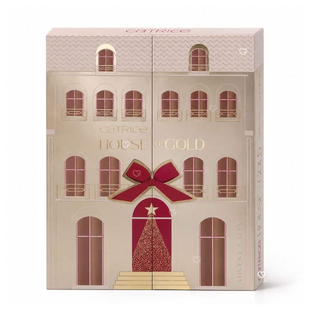 Catrice Advent Calendar 2026 House Of Gold, golden house-shaped box with red bow, front view on white background