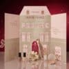 Catrice makeup advent calendar 2026 open, with two nail polishes, brushes, scrunchie and Duo Blush