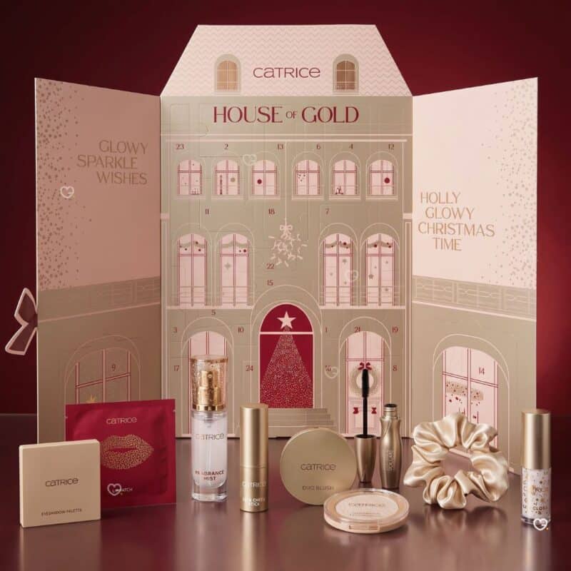 Catrice House Of Gold 2026 advent calendar open, with eyeshadow palette, duo blush, fragrance mist and scrunchie
