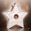 Dior Advent Calendar 2026 star box with gingerbread rooftop detail