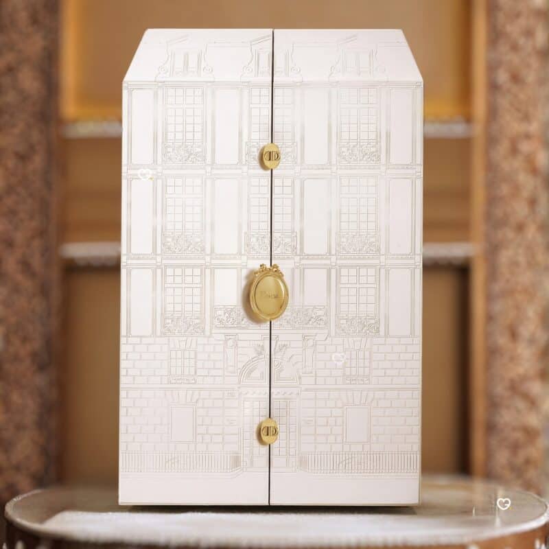 Christian Dior advent calendar 2026 numbered trunk, 30 Avenue Montaigne facade