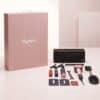 Dyson Advent Calendar 2026 luxury gift box with its haircare tools, sprays, clips and storage bag laid out