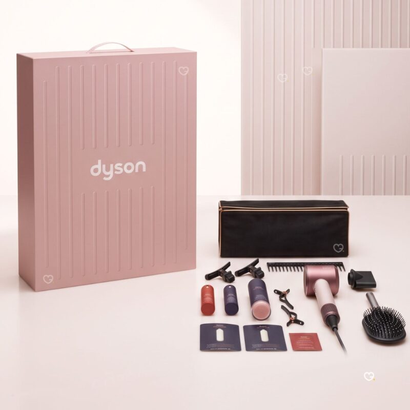 Dyson Advent Calendar 2026 luxury gift box with its haircare tools, sprays, clips and storage bag laid out
