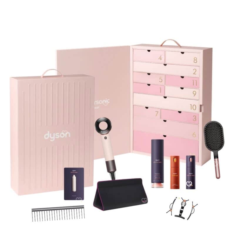 Dyson Advent Calendar 2026 opened showing its 12 numbered drawers with the dryer, brush, comb and styling products in front