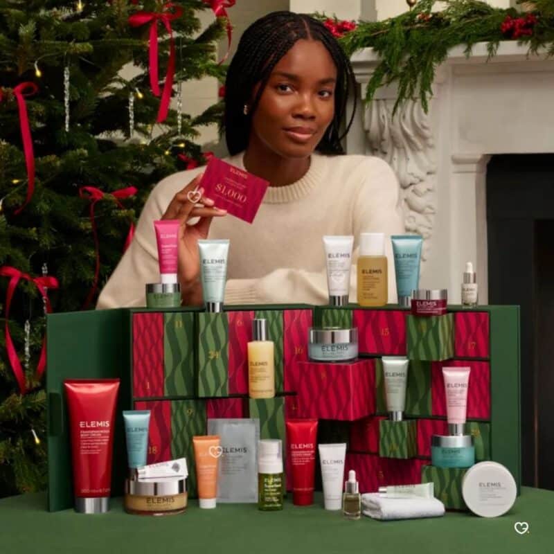 Elemis advent calendar for her 2026 styled by a Christmas tree with the open box