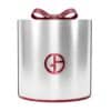 Giorgio Armani Advent Calendar 2026 silver-red panettone cylinder box closed with satin ribbon, Glamorous Winter Escape edition