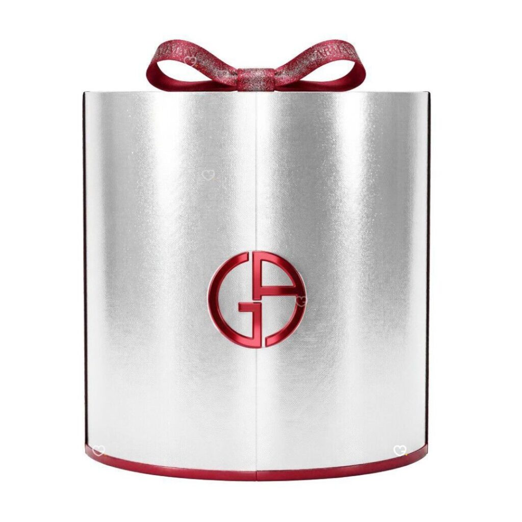 Giorgio Armani Advent Calendar 2026 silver-red panettone cylinder box closed with satin ribbon, Glamorous Winter Escape edition