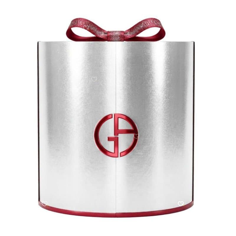 Giorgio Armani Advent Calendar 2026 silver-red panettone cylinder box closed with satin ribbon, Glamorous Winter Escape edition