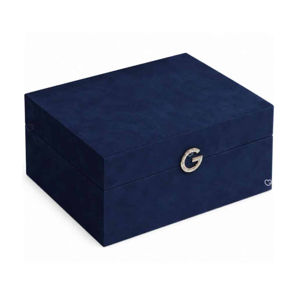 Guerlain Advent Calendar 2026 The Jewellery Box, closed midnight-blue velvet case with a rhinestone G clasp