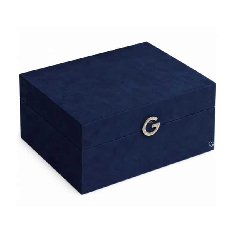 Guerlain Advent Calendar 2026 The Jewellery Box, closed midnight-blue velvet case with a rhinestone G clasp
