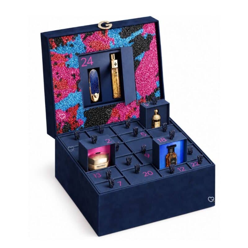 Guerlain luxury advent calendar 2026 open, door 24 revealing a Rouge G lipstick and an Aqua Allegoria fragrance