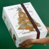 KORRES Advent Calendar 2026 box held in hands, green festive packaging