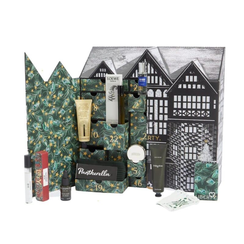 Liberty Men's Advent Calendar 2026 open drawers on a green background