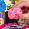 NeeDoh Advent Calendar 2026 candy cane swirl mini squishy behind door 24