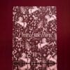 PrettyLittleThing Beauty Advent Calendar 2026 carousel drawer box standing on a burgundy background