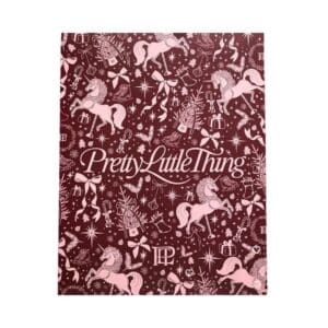 PrettyLittleThing Beauty Advent Calendar 2026 closed burgundy and pink carousel box with gold PLT logo