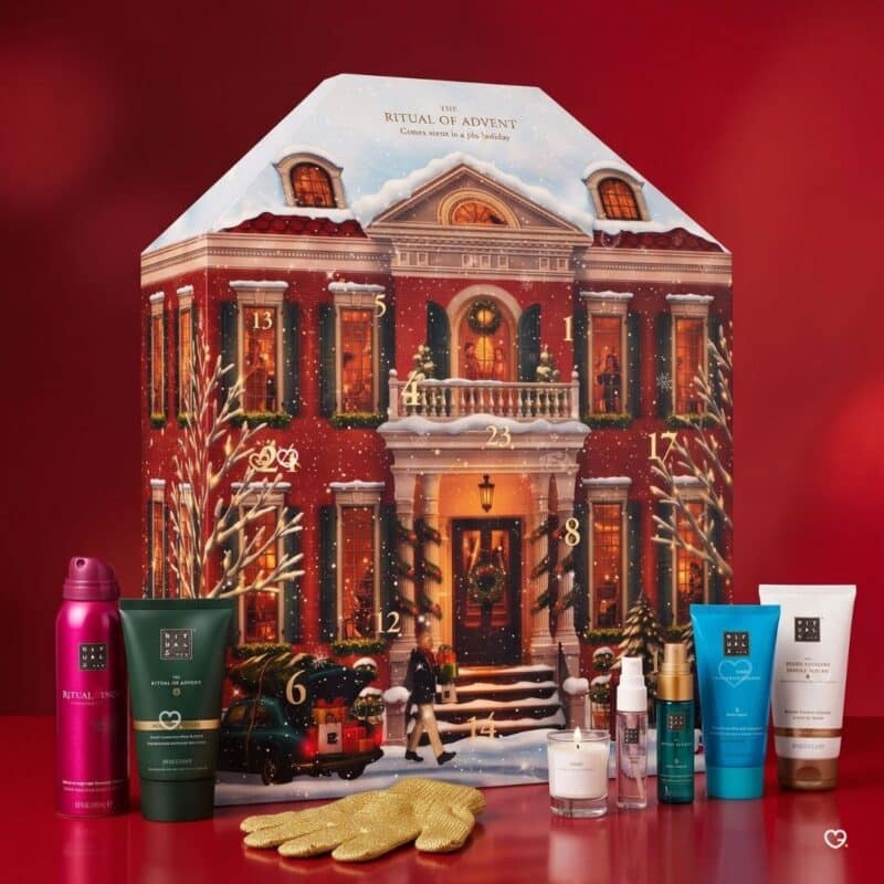 Rituals Advent Calendar 2026 townhouse box with body products and gold scrub gloves on a red background