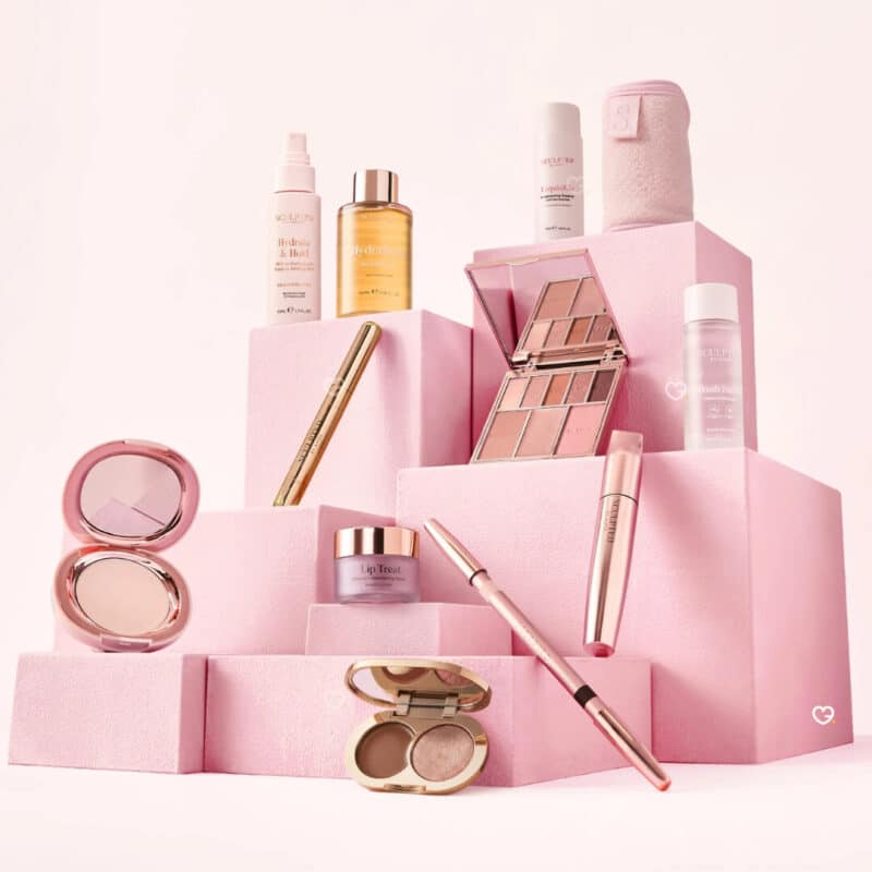 Sculpted By Aimee Advent Calendar 2026 beauty products styled on pink podiums