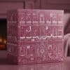 Westwing Advent Calendar 2026 XXL box styled in a pink living room by the fireplace
