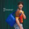 3INA Advent Calendar 2026 tote bag worn, lifestyle shot