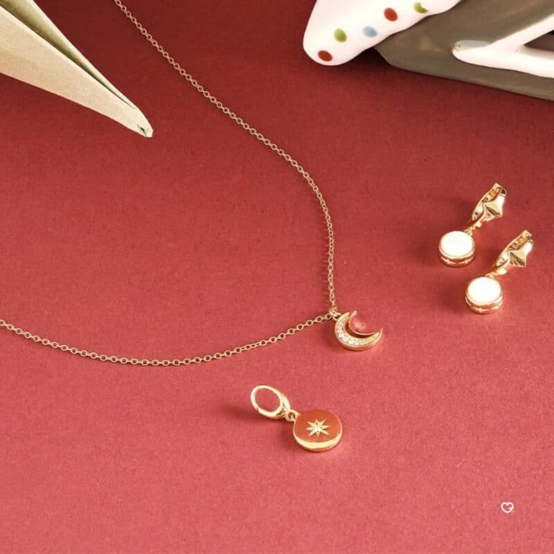 Gold moon pendant necklace and stud earrings from the Astley Clarke advent calendar