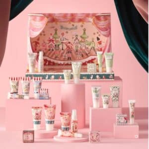 Cath Kidston Advent Calendar 2026 theatre folded out in 3D with the 24 bath and body products arranged in front, pink hero shot