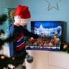 Child playing with the Legami Advent Calendar 2026 village