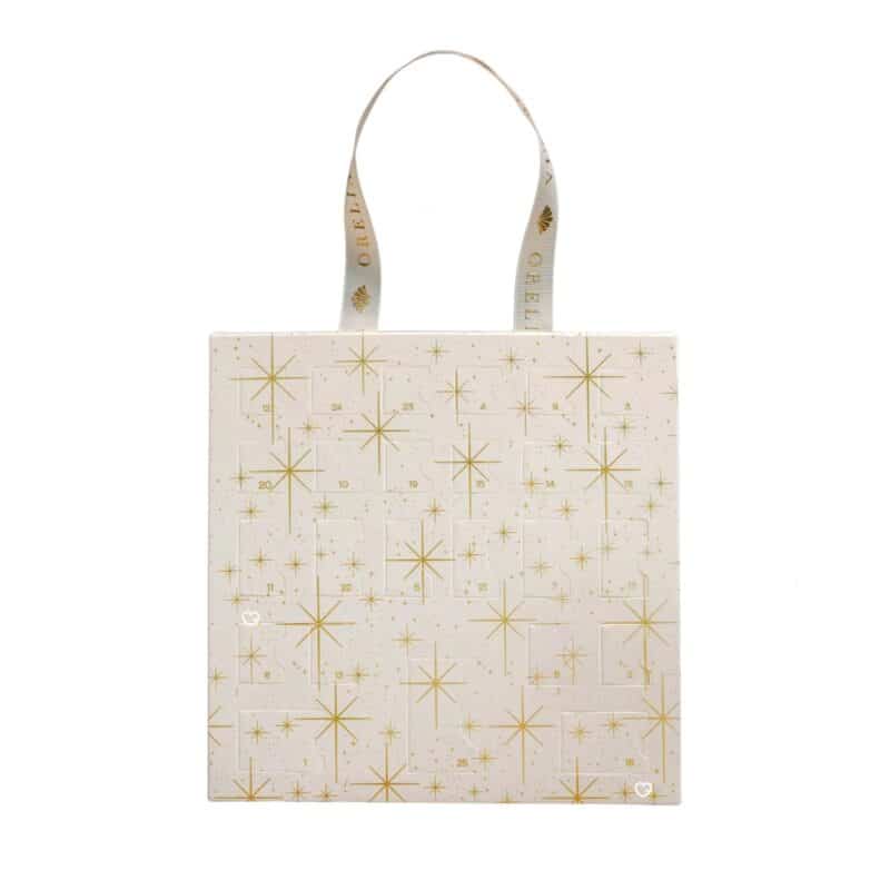 Orelia 25 Days of Ear Stacking Advent Calendar 2026 closed box with 25 gold star doors and ribbon handle