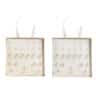 Two open Orelia advent calendars 2026, the gold and the silver editions side by side with their earrings