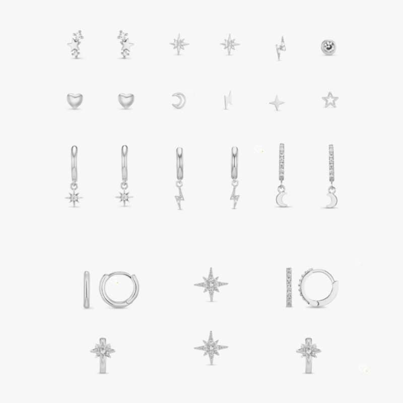 The full set of silver-plated earrings from the Orelia ear stacking advent calendar 2026 laid flat