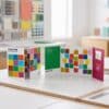 Pantone advent calendar 2026 open triptych displayed in a bright room