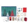 All the Prym Advent Calendar tools and materials laid out: scissors, textile glue, wool, felt, ribbons and beads