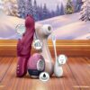 Satisfyer Pro 2 and toys from the Deluxe advent calendar in a festive winter setting