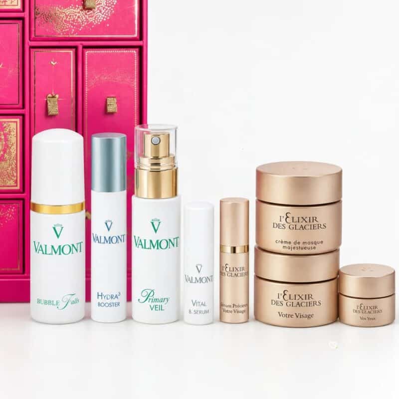 Close-up of the Valmont Advent Calendar 2026 skincare line-up with Elixir des Glaciers and Vital B. Serum