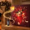 A glass of red wine beside the Virgin Wine Advent Calendar 2026 by the fireside